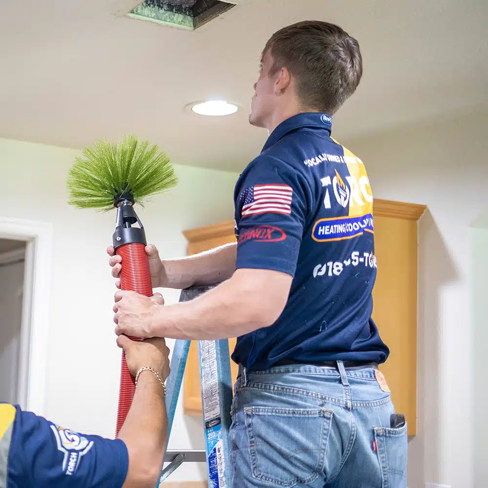 Torch technician duct cleaning home